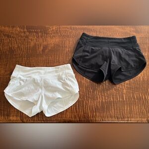 2 PAIRS - black and white size 0 - excellent condition